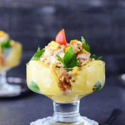 Куриный салат с ананасом, кукурузой и орехами - рецепт с фото