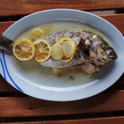 Запеченная рыба сибас по-средиземноморски - рецепт с фото