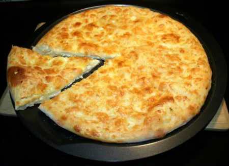 Творожная лепешка с сыром в духовке