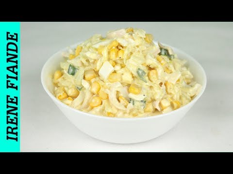 Салат с кальмарами и яйцом и огурцом и кукурузой