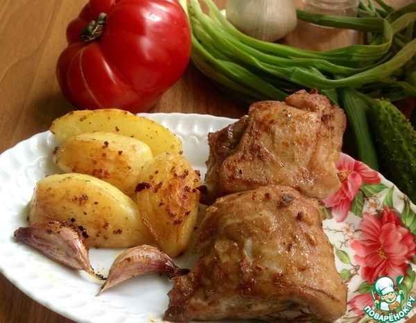Свиная грудинка и ребрышки, запеченные с картофелем