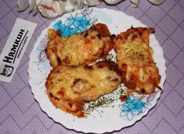 Куриные бедра с сыром и сушеными томатами